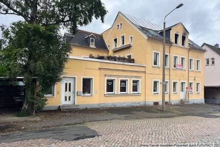 Wohn- und Geschäftshaus zum Sanieren in guter Lage von Freiberg