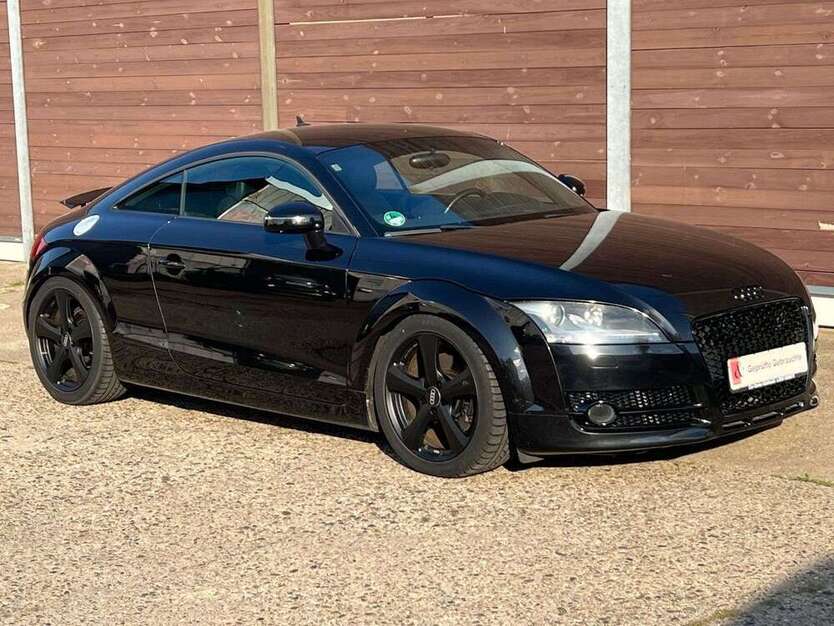 TT