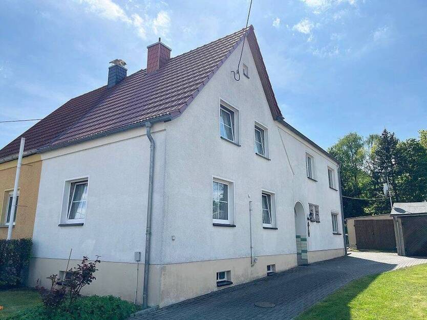 Sonnige Doppelhaushälfte mit Anbau !