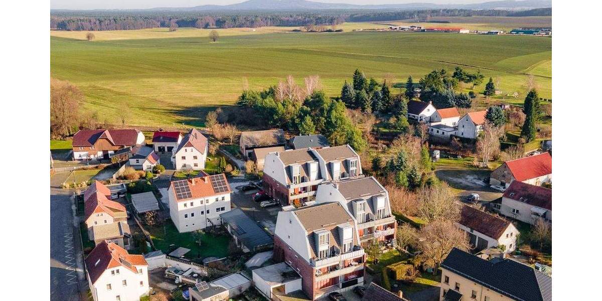 1-Zimmer-Wohnung mit Parkett, FB-Heizung, Stellplatz & Abstellraum in Ottendorf-Okrilla 1 zimmer